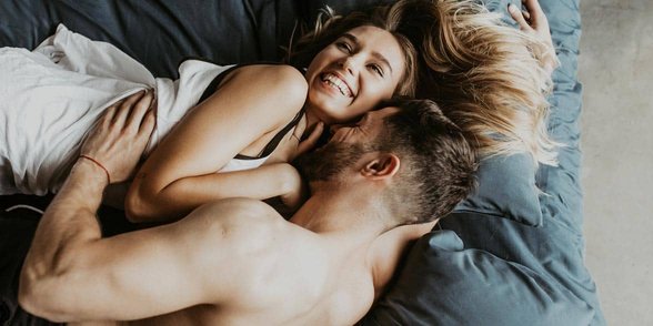 Foto eines Paares im Bett