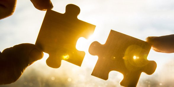 Foto van twee puzzelstukjes