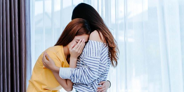 Foto van twee huilende vrouwen